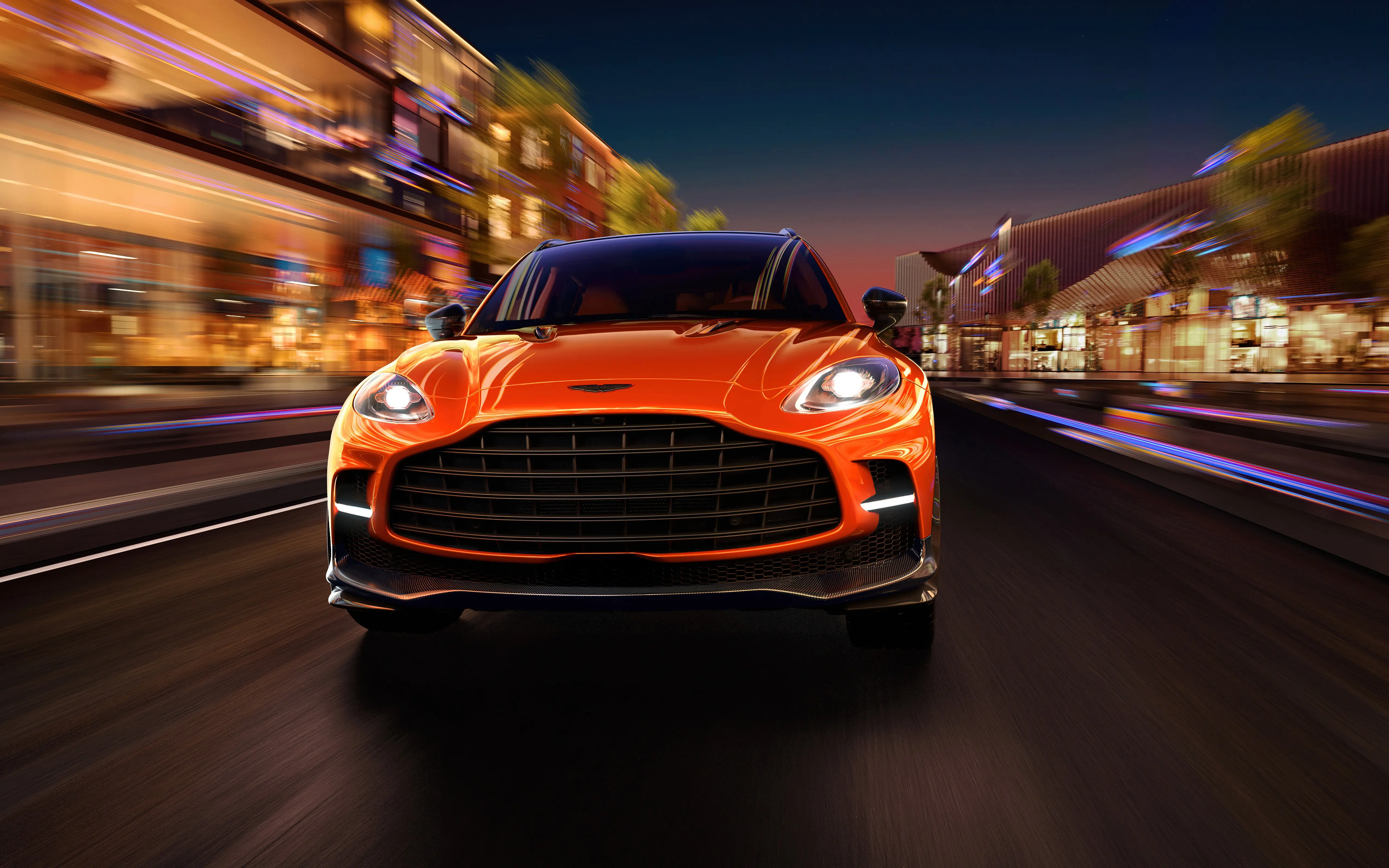 橙色阿斯顿马丁DBX夜景疾驰壁纸 5120×3200 预览图