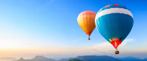 蓝天热气球飞越山峦壁纸 3840×1600 缩略图