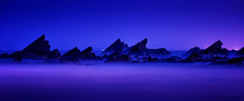 蓝色梦幻海岸礁石夜景壁纸 3840×1600